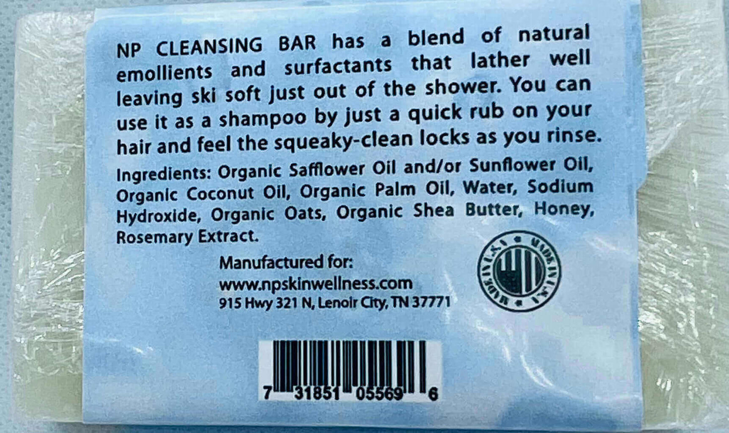 NP Cleansing Bar packaging highlights natural ingredients, benefits for skin and hair, and instructions for use.
