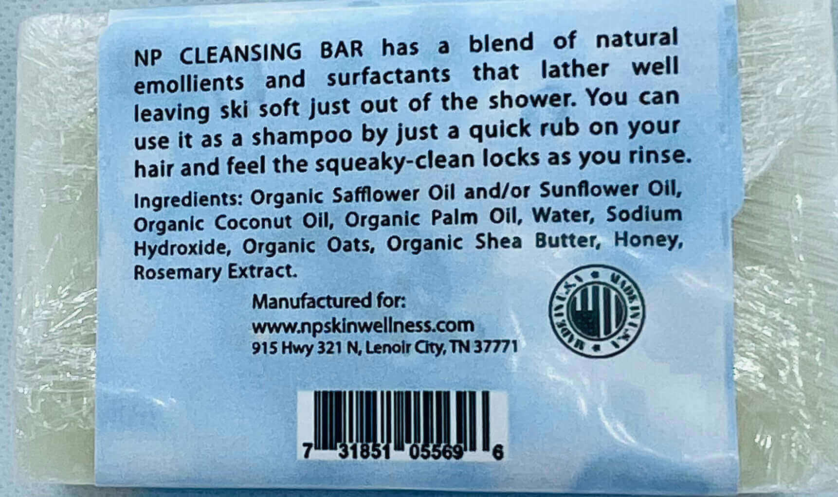 NP Cleansing Bar packaging highlights natural ingredients, benefits for skin and hair, and instructions for use.