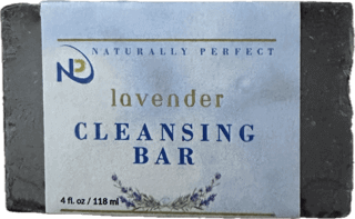 NP Lavender Cleansing Bar with natural skin conditioners and lavender bits for gentle exfoliation.
